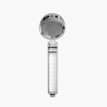 A handheld shower head with a cylindrical handle, round head, and transparent section in the handle.