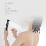 A person with wet hair holds a black showerhead spraying water. Text says, "WATER IN YOUR FAVORITE FORM.