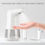 A touchless soap dispenser with "Touchless: Take care of your family