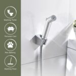 A handheld bidet sprayer on a bathroom wall is for washing the toilet, personal care, pet bathing, and floor cleaning.