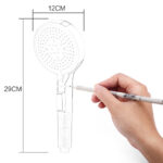 A hand sketches a showerhead with dimensions: 29 cm length and 12 cm diameter.