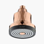 - Sleek rose gold desktop mini air purifier with circular air outlet design, modern and stylish for home or office use.