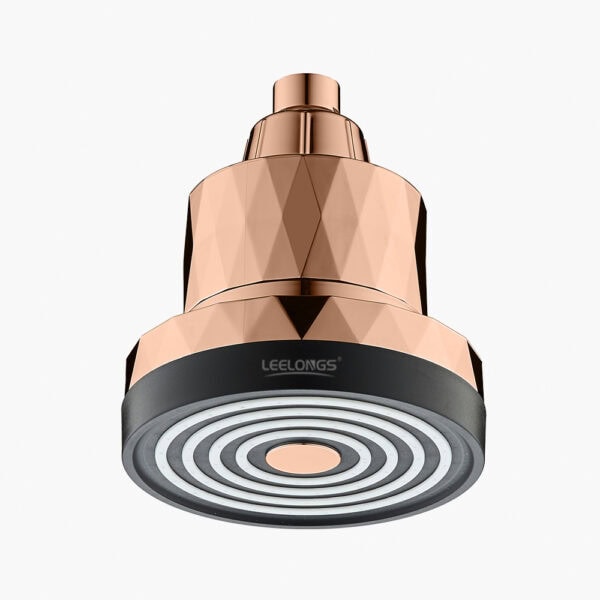 - Sleek rose gold desktop mini air purifier with circular air outlet design, modern and stylish for home or office use.