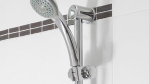 High-quality shower holder with adjustable arm and durable finish, designed for secure and convenient shower head placement in contemporary bathroom settings.