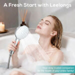 Woman enjoying a relaxing bath with a handheld shower from Leelongs, showcasing modern bathroom fixtures and a soothing bathing experience.