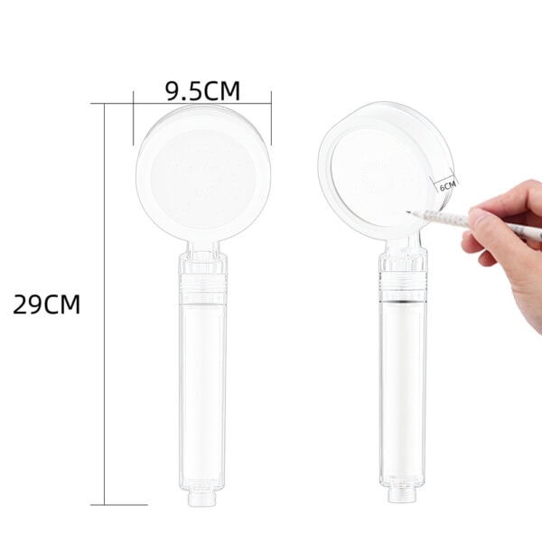 Clear water filter shower head with dimensions 29cm height, 9.5cm diameter, and 6cm filter size, shown with a hand holding a syringe for demonstration.