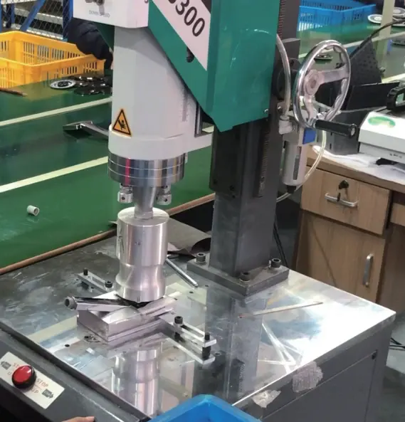 Close-up of a CNC machine performing precise metal cutting in a manufacturing workshop.